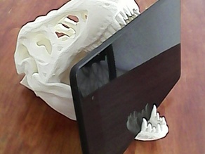 Подставка для планшета в виде головы тиранозавра